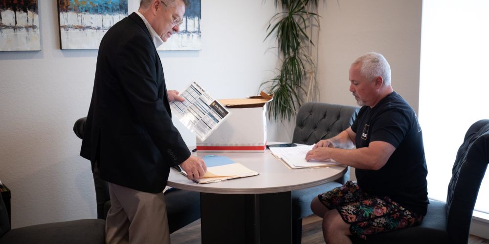 Image of John Working With A Client
